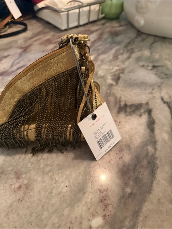 HOBO Handbags - HOBO Metallic Gold Fringe Wristlet